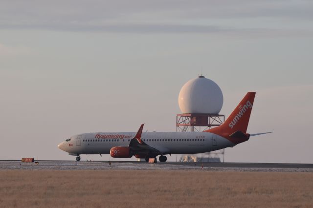 Boeing 737-800 (C-FYJD) - This Sunwing Boeing 737-800 on its takeoff roll for a quick flight from YQR to YXE and then on to catch some warmer sun in Mexico.