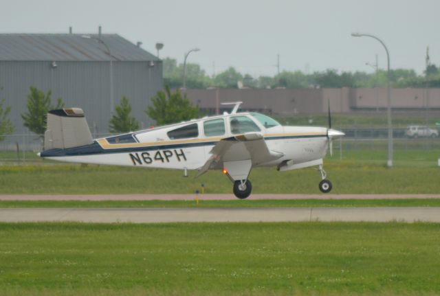 Beechcraft 35 Bonanza (N64PH) - N64PH landing on Runway 15 in Sioux Falls SD on 6-12-15