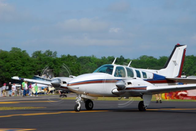 Beechcraft Baron (58) (N58EL) - 2013 Sun n Fun Parade of Planes