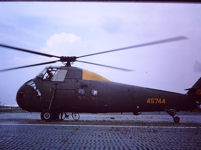 — — - TAN SON NHUT AIR BASE, SAIGON, VIETNAM 1966 Sikorsky H-34 Choctaw being operated by the South Vietnamese