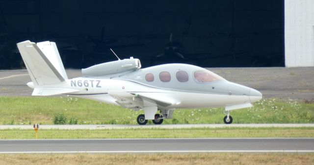 Cirrus Vision SF50 (N66TZ) - Taxiing to parking is this 2019 Cirrus Vision SF50-G2 in the Summer of 2022.