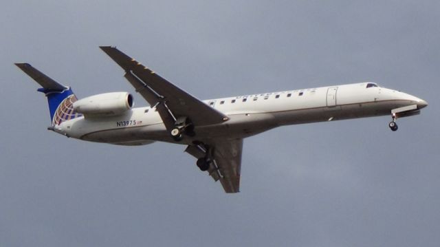 Embraer ERJ-145 (N13975) - N13975 ExpressJet Airlines Embraer ERJ-145LR - cn 145163br /br /Shot on 8-11-13 at P6 Economy Long Term Lot - on airport