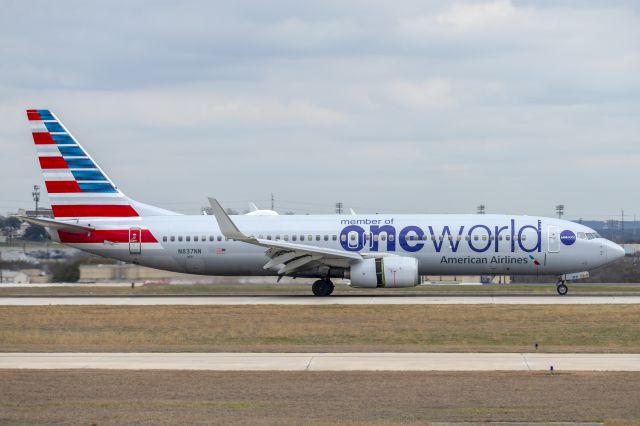 Boeing 737-800 (N837NN) - Arriving 13R on the day of OneWorld's 25th Anniversary.