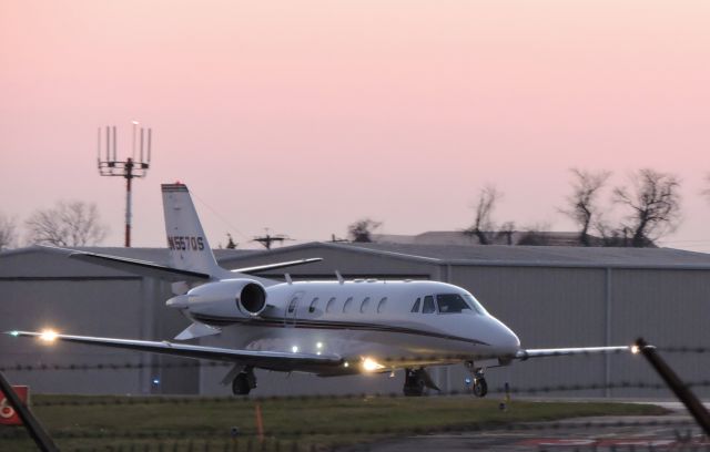 Cessna Citation Excel/XLS (N557QS) - Shown here is this Citation Excel taxiing right after sunset in the Autumn of 2015.