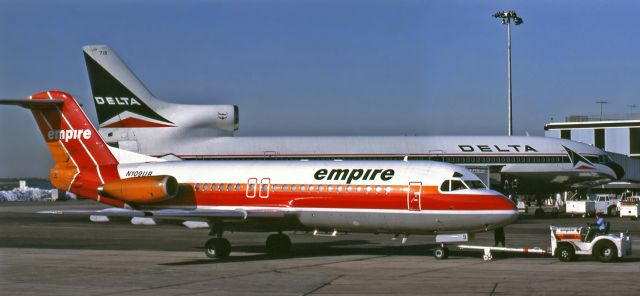 Fokker Fellowship (N109UR) - * Not my photo * * Not my photo *br /Flashback (Around 39 - 41 years ago back to the 1981 - 1983 time frame) ~~br /An Empire Airlines Fokker F-28 Fellowship (N109UR) and a Delta Lockheed L-1011-1 Tristar (N716DA) are ramped next to each other in this heavily resurrected two-photos-combined panorama picture taken at an unknown airport (identified below in COMMENT by ejstar111 as JFK) sometime between 1981 and 1983. This picture, created from two separate snapshots merged into one, is another photo from the memorabilia collection of Mr. Larry Myers.br /** Surprisingly, this picture contains the first photos of both of these aircraft to be entered into FA's photo gallery. **br /br /This photo has been heavily photoshopped, a process that took just over 8 hours, in order to recolorize and repair both images, then combine them into one picture, and then apply further PS remedies to achieve this result.br /br /The histories of both aircraft shown here will be provided below. It will be a lengthy read ....br /1974 ... N716DA delivered to Delta.br /2001 .... N716DA is WFU by Delta and sent to Mojave (KMHV) for storage. A photo on the JP snob site taken at MHV shows it intact but without titles.br /2002 ..... N716DA is b/u at Mojave.br /2007 .... A photo taken by Radek Oneksiak at Mojave shows the sole remaining chunk of N716DA, the tail, literally destroyed.br /br /Early 1980s ... Two photos (one of the front portions and a second of the rear portions) of Empire's N109UR ramped next to Delta's N716DA are taken. Both photos are filed away in the HQ offices of Empire Airlines and forgotten.br /1982 .... The FAA deregisters aircraft reg N498US from a Northwest Airlines B727.br /1986 .... Piedmont Airlines purchases Empire Airlines and acquires Empire's fleet of Fokker F-28 Fellowship aircraft, including Empire's N109UR.br /A couple of years later, Piedmont is bought and is blended into US Air. N109UR is now N498US in the US Air system.br /1995 ... N498US is WFU by US Air.br /Dec, 1995 .... N498US is purchased by Air21.br /Jan, 1997 .... Air21 folds its tent. N498US is purchased by Horizon Air and retains the N498US reg.br /2002 .... N498US is WFU by Horizon and goes into storage at Moses Lake, WA (KMWH).br /2008 ... Mr Larry Myers discovers the long-abandoned and forgotten pictures in an old file cabinet that is being taken to a dump in central New York State. He salvages the badly deteriorated pics and scans them in an effort to preserve the images.br /2021 .... Numerous attempts to contact Mr Myers are unsuccessful and it is rumored that he may have failed to regain his health after battling a long illness.br /2022 .... The two photos he saved 14 years ago are subjected to extensive PS work and are shown as one photo above. Larry, my friend, I did the best I could. (gcs)