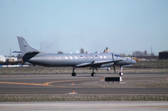 — — - C-26 taxiing in from landing.