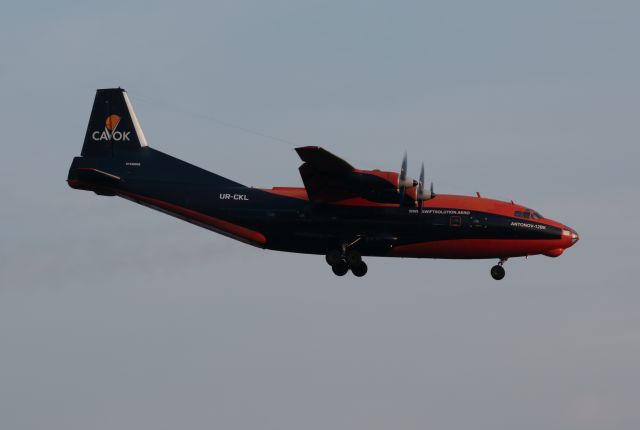 Antonov An-12 (UR-CKL) - Cavok An-12BK arrives into Bush Intercontinental from Fort-de-France at golden hour on 21 July 2021