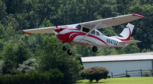 Cessna 205 (N8478Z) - Shortly after departure is this 1963 Cessna 210-5 (205A) in the Summer of 2019.