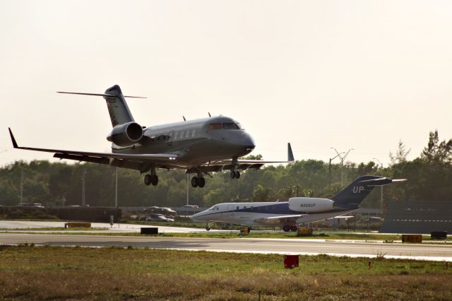 Canadair Challenger (N581TS) - N581TS about to touch down at KBCT on 03/07/2024