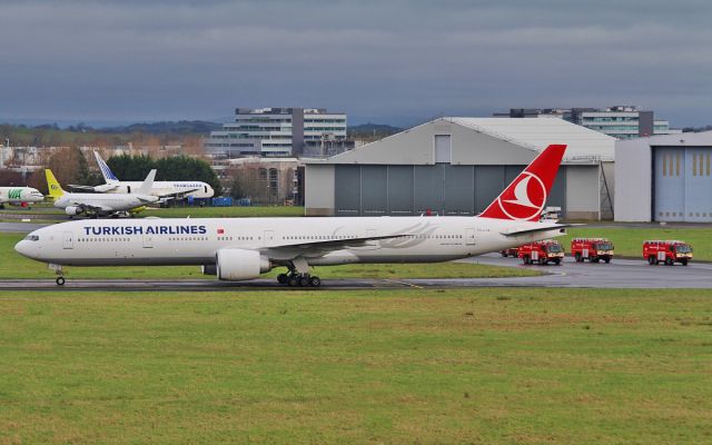 BOEING 777-300 (TC-LJA) - turkish airlines b777-300er tc-lja taxiing to a remote part of the airfield at shannon due to a security alert onboard the flight while enroute from houston-istanbul 24/1/16.