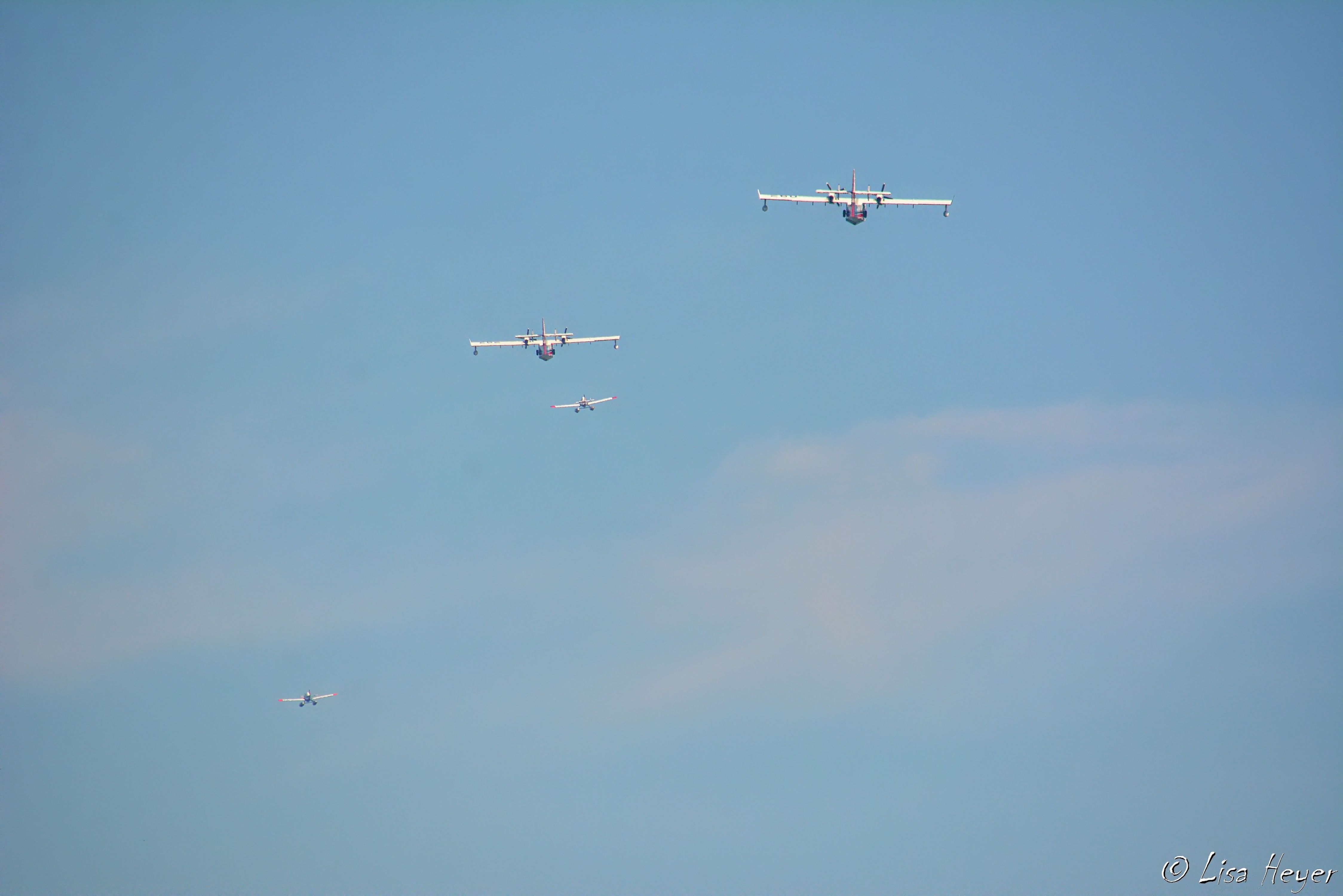 — — - Planes helping fight a local fire in WA.
