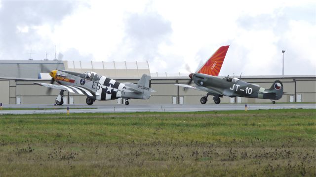 North American P-51 Mustang (N5087F) - Historic Flight Foundations P-51B Mustang and Spitfire Mk. IXe begin their takeoff roll on runway 34L on 11/14/12. They performed a short air show as part of the delivery ceremonies for the LOT 787-8.