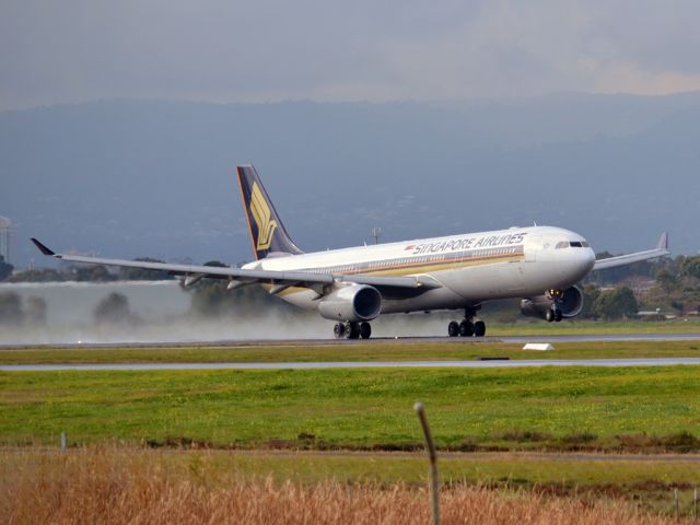 Airbus A330-300 (9V-STP) - Getting airborne off runway 23 on a gloomy, cold winters day and heading home to Singapore.  Wednesday 4th July 2012.