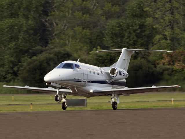 Embraer Phenom 100 (N784JP) - Take off runway 26.