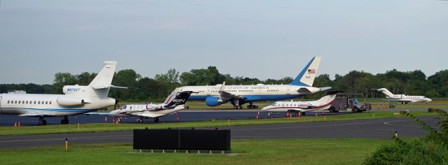 Boeing 757-200 (09-0015) - MORRISTOWN, NEW JERSEY, USA-AUGUST 02, 2019: A crowded day at Morristown Municipal Airport with Air Force One in the background and several smaller jets around it. When flying into or out of Morristown Airport, the Air Force uses the Boeing 757-200 as Air Force One, instead of the larger 747, because of shorter runways at Morristown. Picture was taken approximately ninety minutes after Air Force One landed.