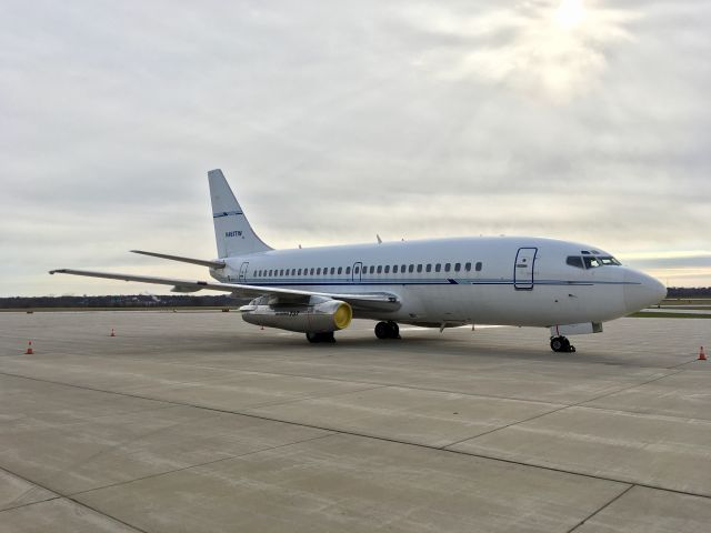 Boeing 737-200 (N467TW) - N567TW parked on the Terminal Ramp at Purdue University Airport (KLAF) after delivering a sports team to a competition.