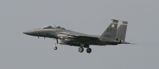 McDonnell Douglas F-15 Eagle — - F-15 Eagle. I was driving north out of Destin passing Eglin AFB where they had numerous jets performing touch & gos. I pulled over and took photos of this impromptu airshow.