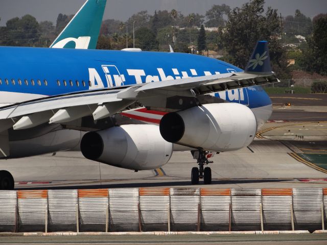 Airbus A340-300 (F-OSEA) - Air Tahiti Nui A340-313X holding short of 24L