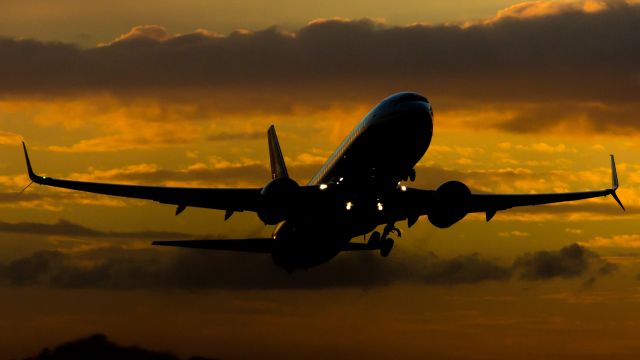 Boeing 737-800 (N517AS) - Departing runway 07 to LAX just after the sunset!