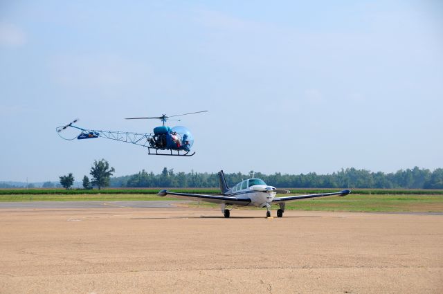 Beechcraft Bonanza (33) (N166B) - While at the airport a 1965 47G-3B Turbo came in. What a awesome aircraft.