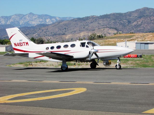 Cessna 421 (N421TM) - Taxiing at Brackett Field