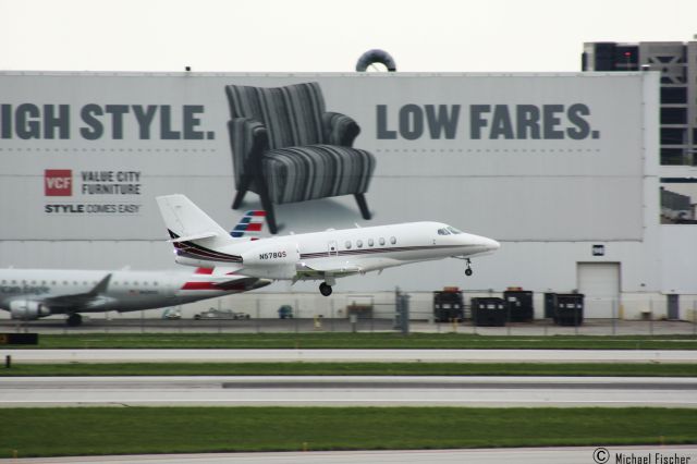 Cessna Citation Sovereign (N578QS) - Netjets Latitude departing runway 28L at John Glenn International. 