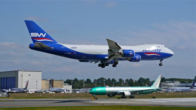 BOEING 747-8 (VQ-BVC) - BOE642 on final to Rwy 16R to complete a flight test on 8/21/14. (LN:1496 / cn 44937).  BOE267 (#A6-ETS) is on the taxiway behind.