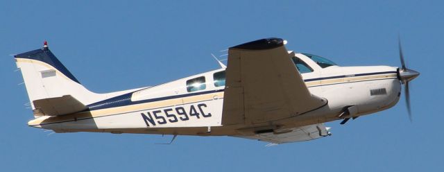 Beechcraft Bonanza (36) (N5594C) - Departing rwy 9 on 10/25/13...