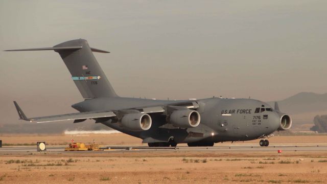 Boeing Globemaster III — - C-17 Globemaster III taxi past RWY08 short field arresting gear prior to departure.