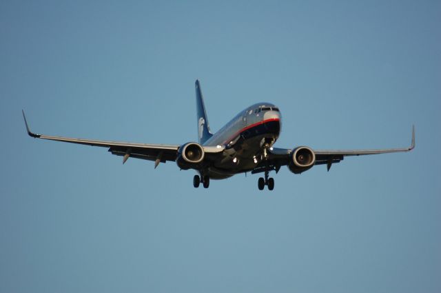 Boeing 737-800 (N852AM) - On final for 27 at IAH.