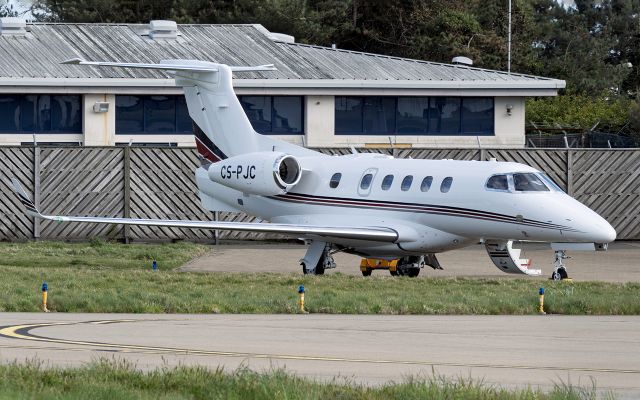 Embraer Phenom 300 (CS-PJC) - Netjets Phenom 300 parked at Gama Aviation on 28/Mar/2025