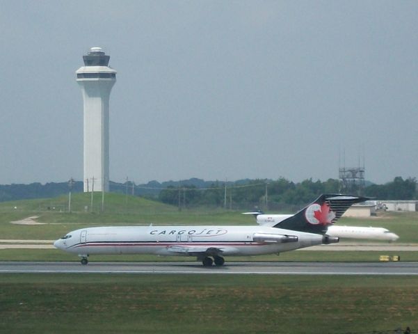 BOEING 727-200 (C-GCJZ) - CargoJet 915 Departs 18L as Comair 4697 awaits for taxi clearence.    Taken: 6/26/2010