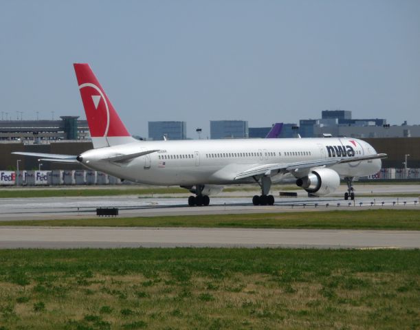 BOEING 757-300 (N596NW) - Northwest N596NW taxiing for departure on 12R at KMSP.  May 31, 2009.