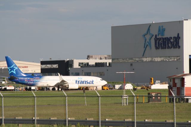 Boeing 737-800 (C-GTQB) - At Air Transat terminal at Montréal-Trudeau