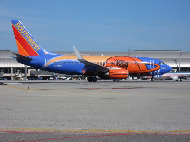 Boeing 737-700 (N224WN) - Holding on RWY 19R