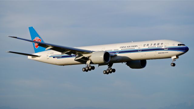 BOEING 777-300 (B-2048) - BOE397 on final to Rwy 16R to complete an evening flight test on 7/17/14. (LN:1219 / cn 43220).