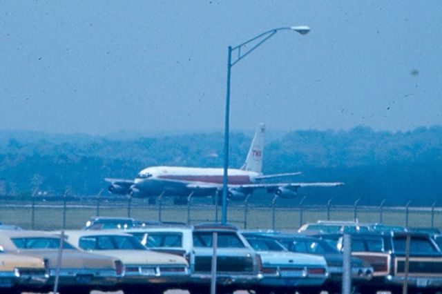 Boeing 720 — - TWA Boeing 720 starting Take Off roll on runway 15, KBWI, circa 1965-70.  Another D--- light pole intruding.