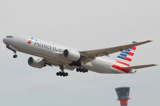 Boeing 777-200 (N774AN) - An American Airlines B777-200 taking off from runway 27L at LHR.br /br /Location: Heathrow T5 spotting point.br /Date: 21.08.22 (dd/mm/yy).