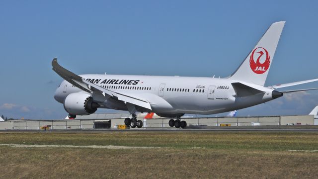 Boeing 787-8 (JA824J) - BOE178 touching down on runway 34L to complete its maiden flight on 9/3/12. (LN:27 c/n 34834).