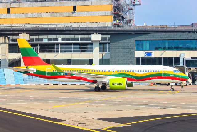 Airbus A220-300 (YL-CSK) - Pushing back from the gate, almost about to snooze. I look over to my right, and see Air Baltic getting ready to cruise!