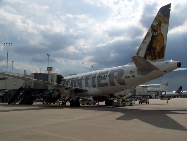 Airbus A318 (N807FR) - At A52 A Concourse DIA awaiting departure...