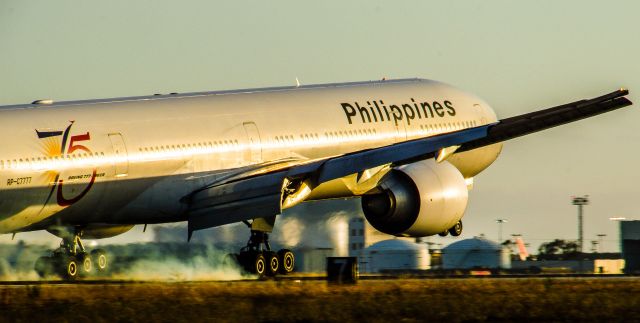 BOEING 777-300ER (RP-C7777) - Philippine Airlines flight PR102 comes smashing her big feet at LAX after a long haul from Manila during golden hour and also boasting the 75th anniversary decal on the aircraft 