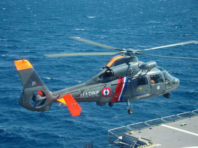 — — - french navy helicopter landing to french navy ship DIXMUDE  mediterean sea