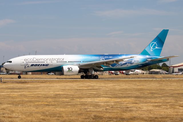 Boeing 777-200 (N861BC) - Quite a special visitor. It was at MCC for just one day, being used for tours for the nearby Aerospace Museum of California.  Photo taken at a dead end at E Street