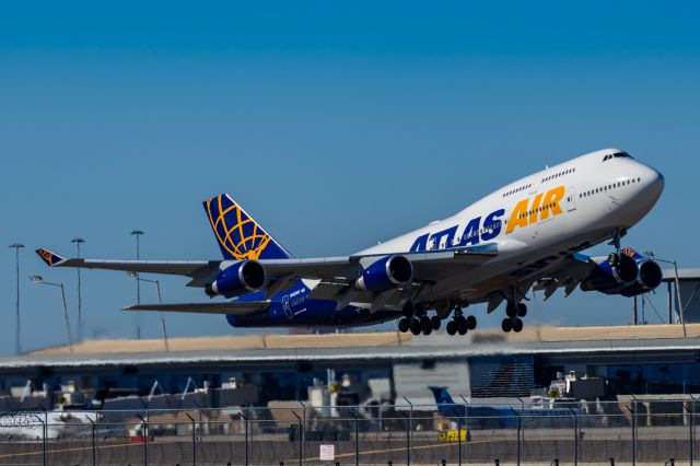 Boeing 747-400 (N482MC) - An Atlas Air 747-400 taking off from PHX on 2/10/23 during the Super Bowl rush. Taken with a Canon R7 and Canon EF 100-400 II L lens.