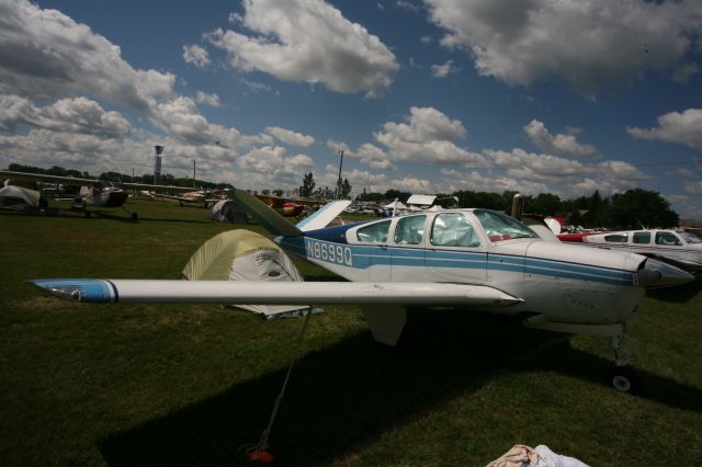 Beechcraft Bonanza (36) (N8699Q) - See more planes from the 2013 EAA Airventure here- a rel=nofollow href=http://www.facebook.com/media/set/?set=a.10153121083865078.1073741840.283142505077&type=1https://www.facebook.com/media/set/?set=a.10153121083865078.1073741840.283142505077&type=1/a