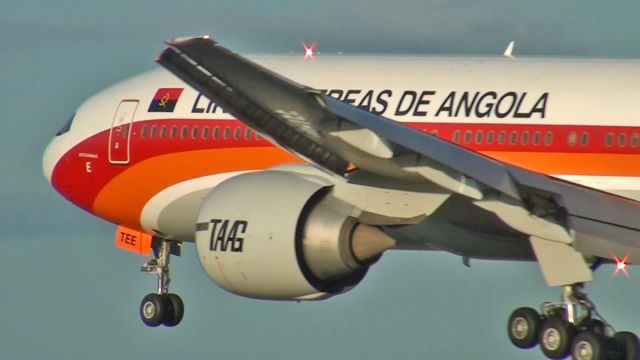 Boeing 777-200 (D2-TEE) - Colorful bird arriving at Lisbon Airport!