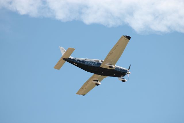 Piper Saratoga (N410CP) - Seen out our back door on Pegasus Airpark