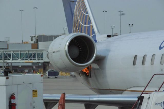 Canadair Regional Jet CRJ-200 (N963SW) - My flight to SLC was delayed because there was a fuel leak in the APU, which ignited as the aircraft pulled up to the gate. I snapped a couple photos the moment I saw flames spouting out of the side of the APU, as my camera was already up and ready, looking for rare liveries. None of the passengers besides me seemed to notice the incident, as the fuel burned up quickly, but there were plenty of complaints after our flight was delayed by 2 hours so we could board another plane.