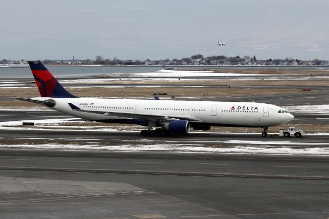 Airbus A330-300 (N810NW) - DAL 231 from Amsterdam Schipol catches a tow to the gate.